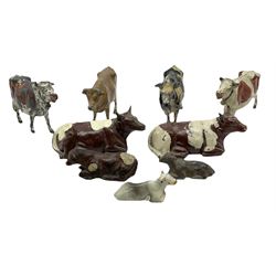 Britains Nestles 'The World's Cow' decorated with map-of-the-world pattern L8cm; and eight other various sized lead figures of cows, standing or reclining, by Britains, Hill & Co etc (9)