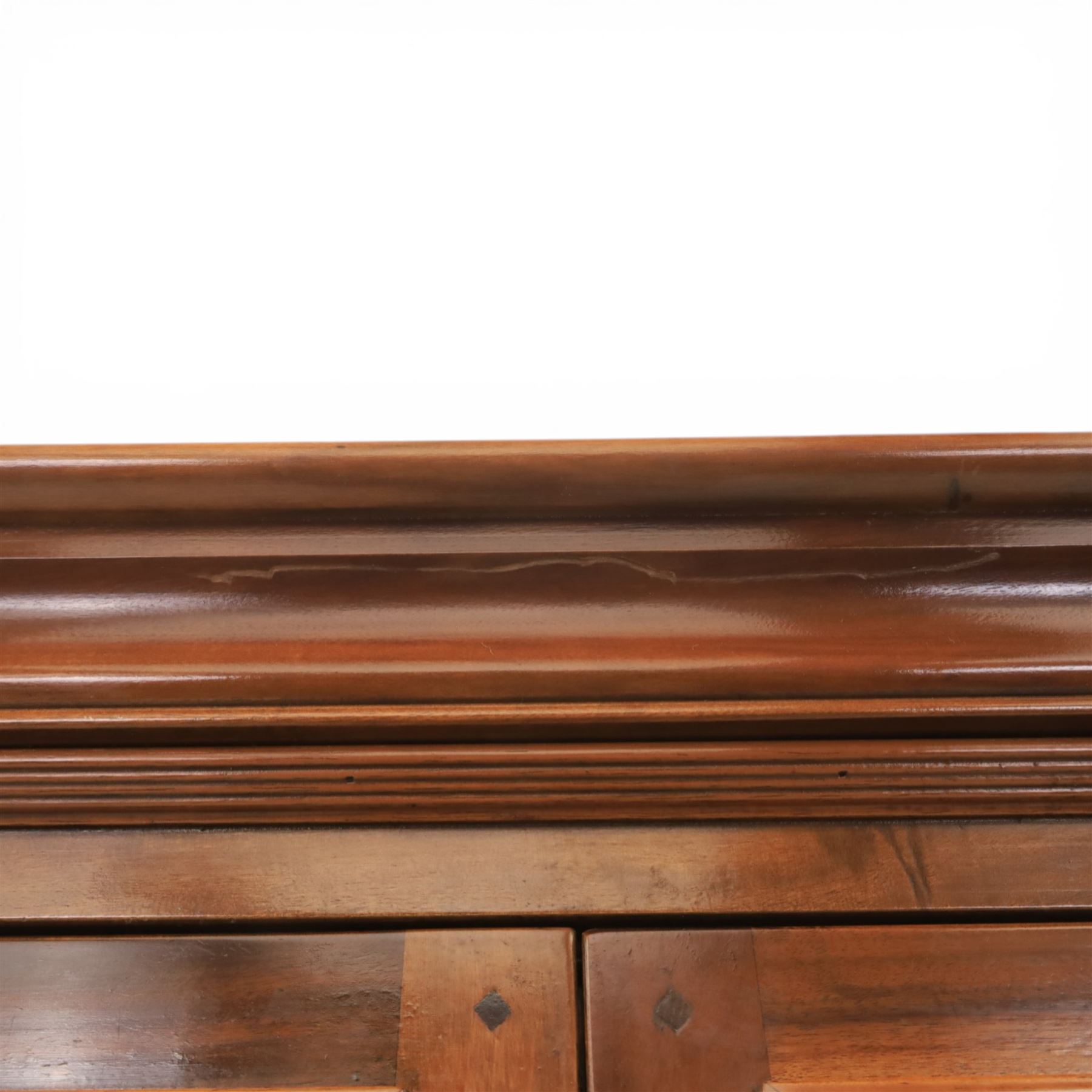 Willis & Gambier - French cherry double wardrobe, moulded cornice above panelled doors, enclosing a shelf and wooden hanging rail, raised on a moulded plinth with bracket feet