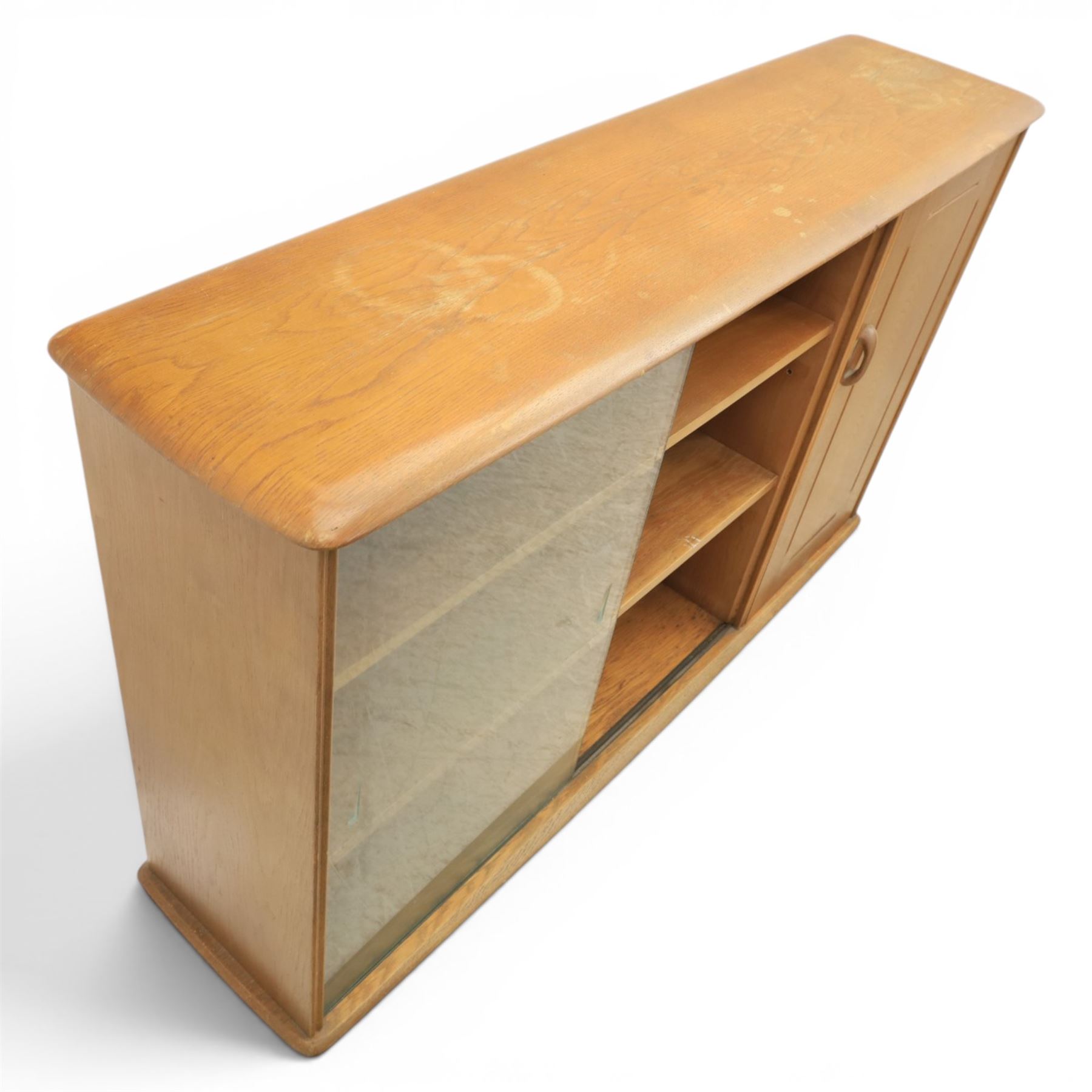 Mid-20th century elm and beech drinks cabinet with fall-front, with matching low bookcase

(Cabinet H 113cm, D 42cm, W 80cm)
(Bookcase H 87cm, D 35cm, W 137cm)