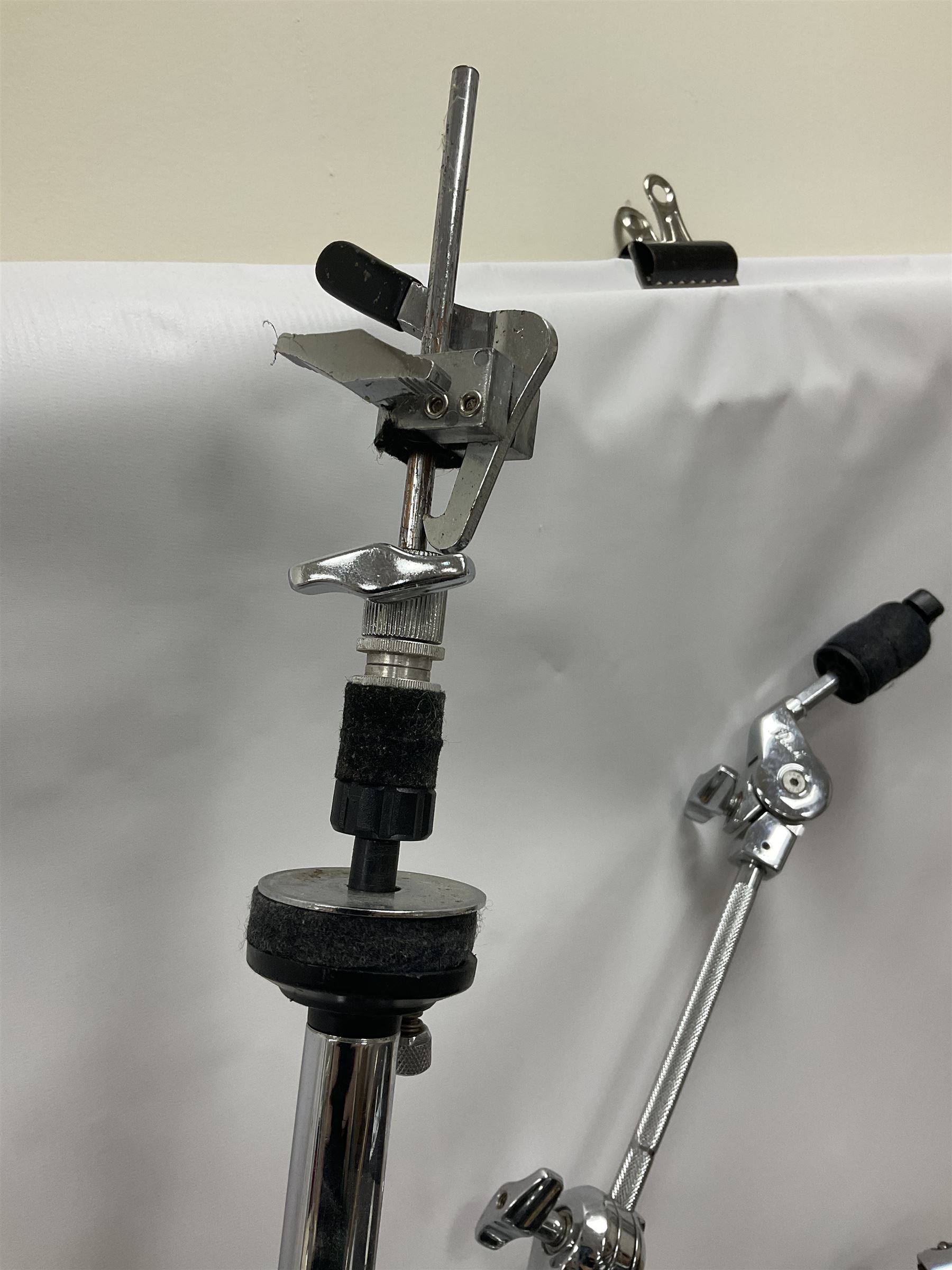 Pearl Vision SST Birch Ply shell four-piece drum kit in black comprising bass drum with foot pedal and three graduated toms; together with Pearl Custom Alloy Sensitone steel snare drum, drum and cymbal stands, microphone stand, stool and various drum sticks 