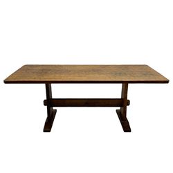 Yorkshire Oak 'Kingpost' - oak dining table, rectangular adzed top on tapered end supports, united by pegged stretchers carved with kingpost signature, on sledge feet, by Robert Ingham, Burton Leonard, Harrogate 