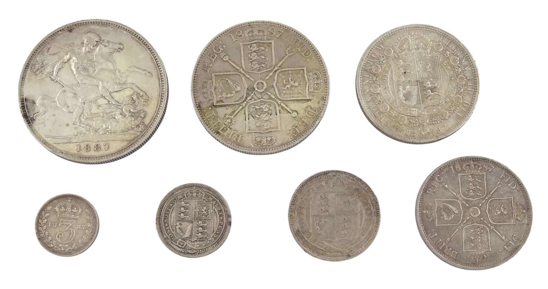 Seven Queen Victoria coins, all dated 1887, comprising threepence, sixpence, shilling, florin, half crown, double florin and crown