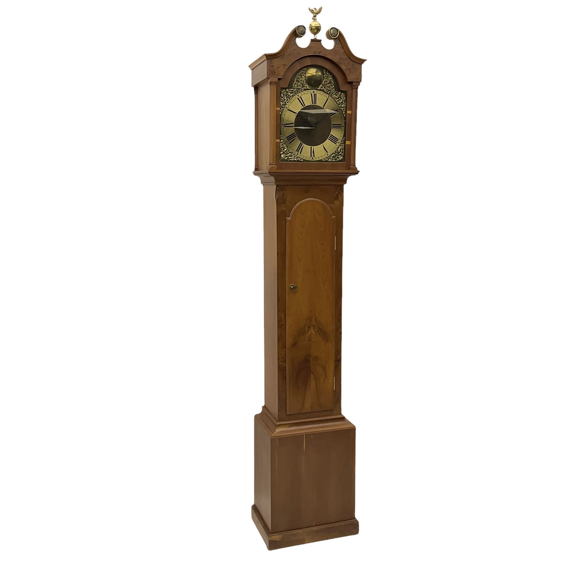 A bespoke handmade 20th century longcase clock in a slim Yew wood case with a German three train weight driven movement sounding the hours and quarters on 12 gong rods, with a brass break-arch dial, cast brass spandrels and an etched chapter ring, Roman numerals and minute track, dial engraved 'Parkinson Liner',  convex boss to the arch engraved 'Tempus Fugit', strike silent facility, With triple weights & Pendulum. 


