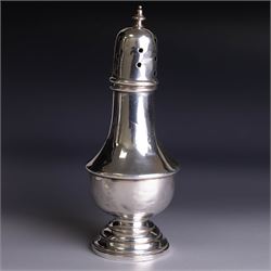 1920s silver sugar caster, of typical form with removable pierced cover and weighted base,...