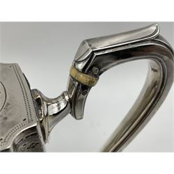 Victorian three-piece silver tea service, comprising teapot, twin handled open sucrier and milk jug, of oval form with shaped rim and C handles, each engraved with crests and bands of strapwork decoration, the milk jug and sucrier with gilt interiors, hallmarked Josiah Williams & Co, Exeter 1881, the teapot with ivory insulators and finial, all contained with a tooled leather, blue silk and velvet lined fitted case, retailed by West & Sun, Dublin 
This item has been registered for sale under Section 10 of the APHA Ivory Act