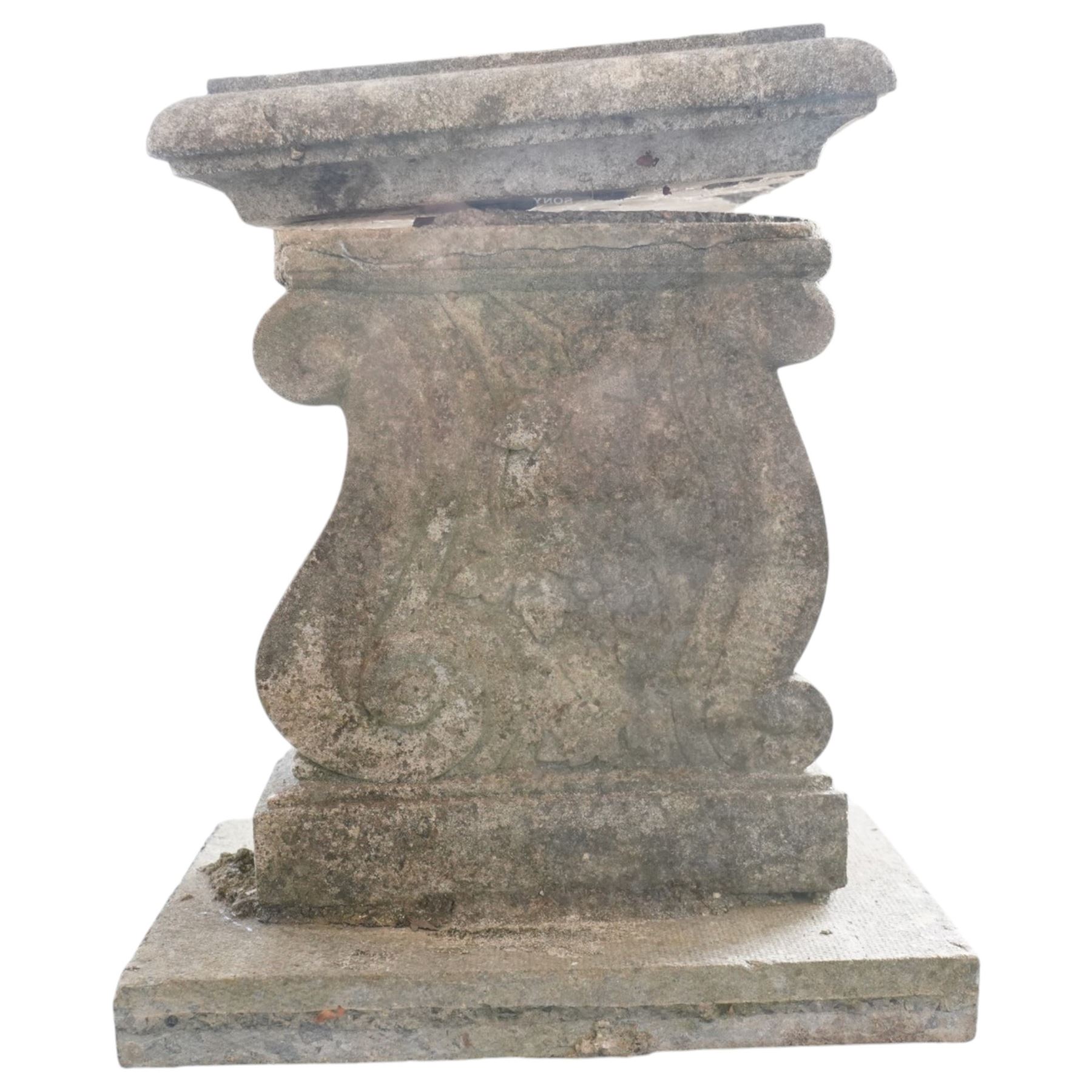 Cast stone garden bench with moulded edge