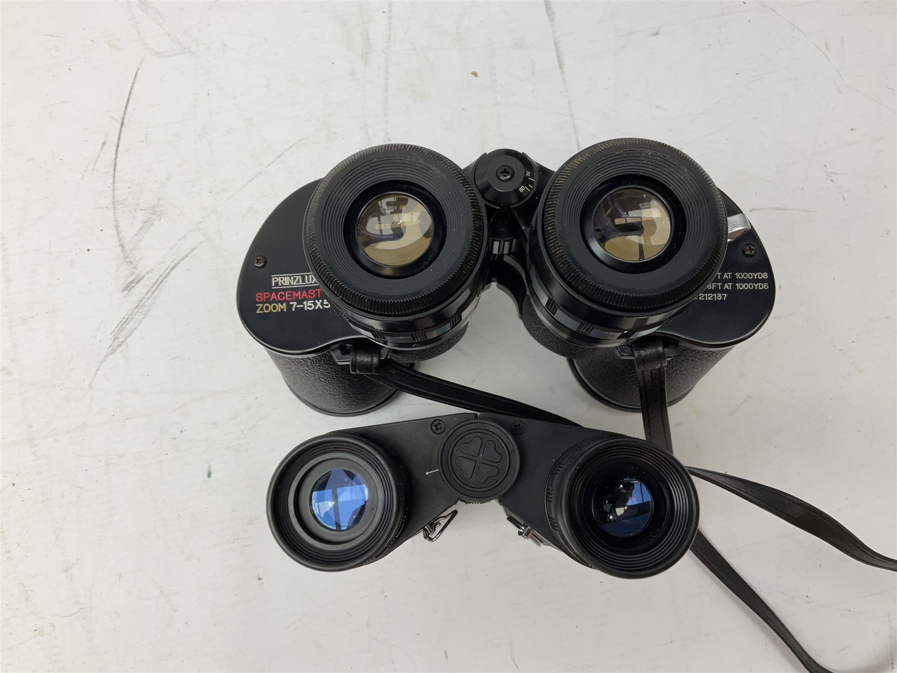 Nine cased pairs of binoculars, to include Tohyoh 22x70, Greenkat 7x- 12x50, Chinon, Fisher-Dietz 7x50, etc