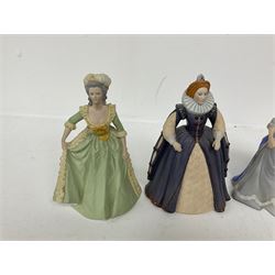 Four limited edition Franklin Mint figures of queens comprising Elizabeth I, Isabella of Spain, Catherine the Great and Marie Antoinette