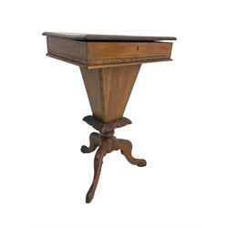 Victorian walnut work table, the rectangular hinged top inlaid with a chessboard design, canted edge with alternating ebony and satinwood inlays, concealing fitted interior, banded and strung frieze over tapering column well, collar carved with foliate decoration, on a cabriole tripod base