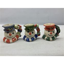 Three Royal Doulton The Mickey Mouse Collection figurines comprising Mickey Mouse MM1, Minnie Mouse MM2, and Goofy MM5, together withe three Royal Doulton limited edition miniature snowman character jugs comprising Christmas Stocking Snowman D7124, Christmas Cracker Snowman D7158 and Snowman D7062, all with original boxes 