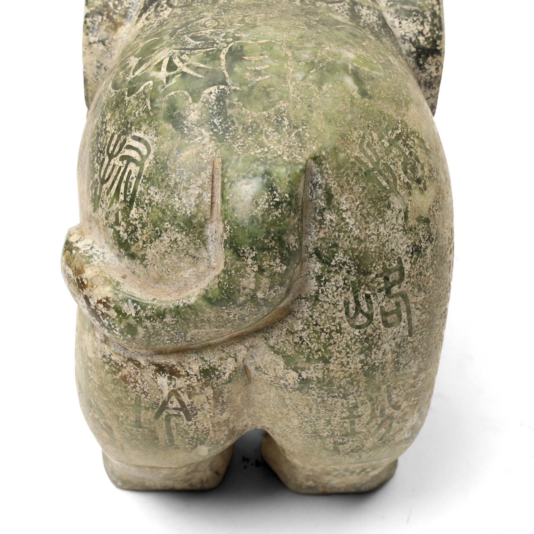 Carved stone Rhino, W44cm and a pair of two green stone Elephants, W38cm (3)