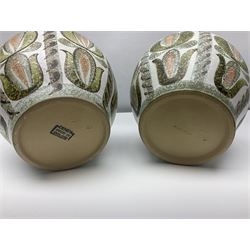 Pair of Denby Glyn Colledge stoneware vases of baluster form with floral decoration over cream ground, together two jardiniere in a similar design, vases H24cm