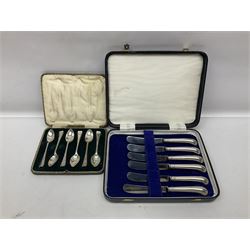 Set of six 1920s silver spoons, hallmarked, together with a set of six silver plated piston grip handled butter knives, both within fitted cases