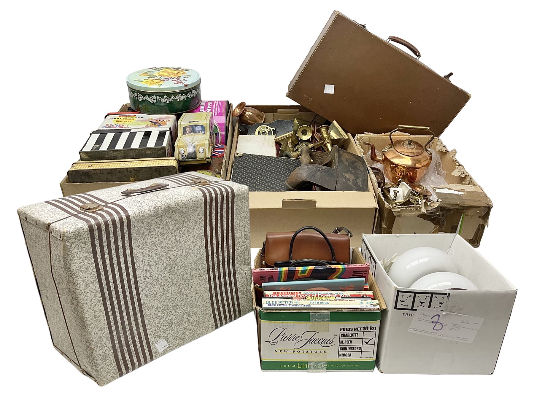 Collection of silver plated cased cutlery including part canteens and butter knives, together with other metal ware including J&J Siddons iron, horse brasses and a copper kettle, 1970s children's annuals including Beano, two handbags and three suitcases, vintage tins etc, in four boxes 