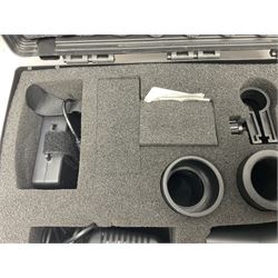 Two Nite-Site add-on kits in hard plastic carrying cases; one with charger