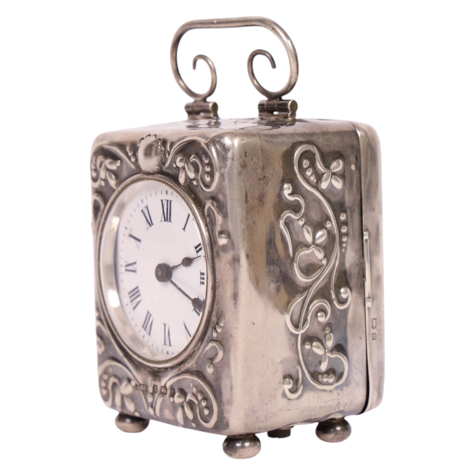 Edwardian miniature silver cased carriage clock timepiece, hallmarked Henry Clifford Davis, Birmingham 1904, the white enamel dial with roman numerals, French movement with fixed key wind, H8cm