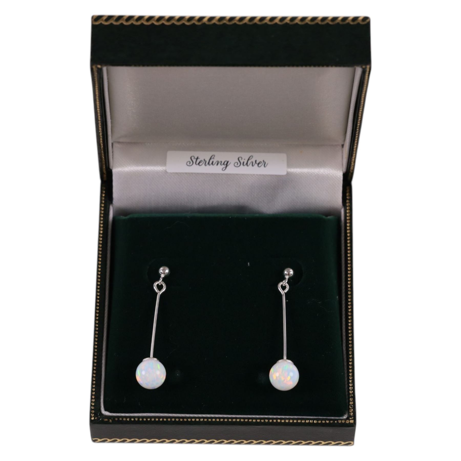 Pair of silver opal pendant stud earrings, boxed