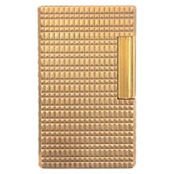Two S.T. Dupont lighters, comprising red laque-de-chine example, boxed and a gold-plated textured example