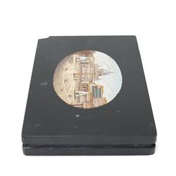 19th-century Italian Grand Tour micromosaic paperweight, the rectangular slab of polished Nero Belgio black marble inset with an oval micromosaic panel finely composed in minute tesserae, depicting a classical architectural view evocative of ancient Rome, centred by a triumphal column and flanked by monumental buildings, 14cm x 9.5cm