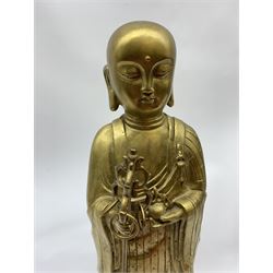 20th century Chinese gilt brass model of Ananda, H47cm