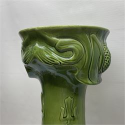 Jardiniere and stand, the jardiniere modelled as a pale, the stand with foliate and foliage decoration on a green ground, stand H73cm 