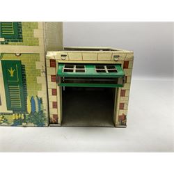 Mid-20th century Mettoy tin-plate double-fronted two-storey doll's house, the front elevation with five unglazed windows flanked by green shutters, central opening door, open back giving access to five rooms together with an attached garage, 60cm wide