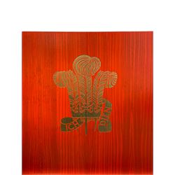 Prince Charles Investiture Chair - designed by Lord Snowdon, manufactured by Remploy, 1969, red finish and decorated with the Prince of Wales's feathers and moto 'Ich Dien' in gilt, later upholstered seat in 1950s design Welsh blanket weave fabric 