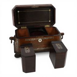 Tea caddy of sarcophagus form, inlaid with mother of pearl decoration,  the hinged lid opening to reveal two covered compartments, H24cm 