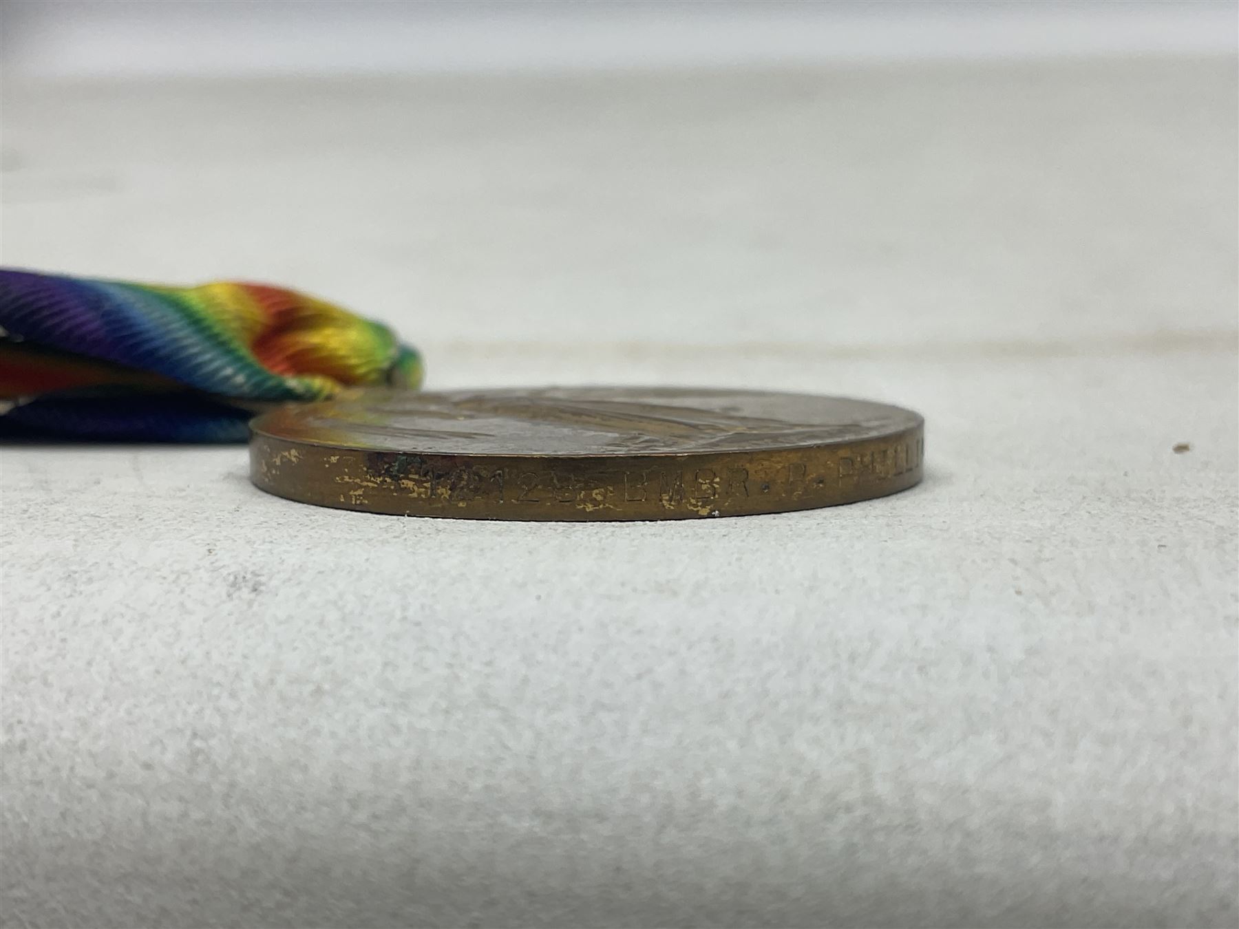 WW1 pair of medals comprising British War Medal and 1914-15 Star awarded to 1440 Pte. J. Wood Lan. Fus.; and WW1 Victory Medal awarded to 12128 Bmbr. R. Phillips R.A.; all with ribbons (3)