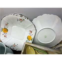 Two Beswick jugs decorated with palm trees, together with matching wall pockets, and similar ceramics, together with six Shelley dishes  