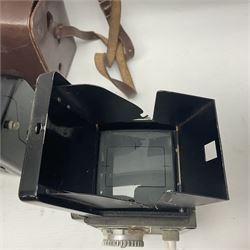 Franke & Heidecke Rolleicord twin lens camera, serial number 012706 with Heidoscop-Anastigmat f=7.5cm' lens and a 'Carl Zeiss Jena Triotar 1:4.5 f=7.5cm' lens, serial no 1474898, together with three similar cameras, including SEM TLR, serial no 420218, Ising Pucky box and Ferrania Elioflex, three in leather carry cases