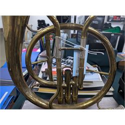 Boosey & Co Ltd French horn, converted into a table lamp, upon a wooden plinth, H45cm