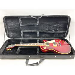 1980s Les Paul Epiphone limited edition cut-away electric guitar by Gibson, the burgundy coloured body with two pick-ups, volume and tone knobs and scratch plate, original tuning pegs, serial no.U6030215, 101cm overall; in modern Kinsman fitted carrying case