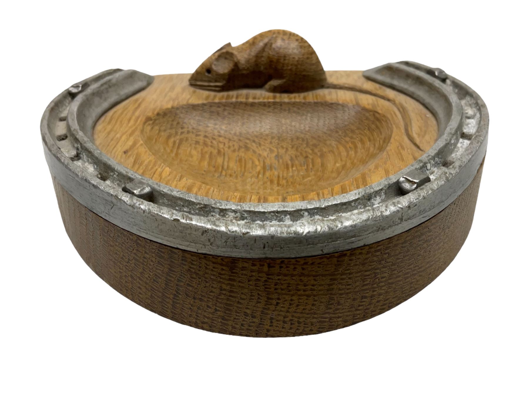 Mouseman - oak horseshoe ashtray, rounded triangular form with mounted horseshoe, carved with mouse signature, by the workshop of Robert Thompson, Kilburn, L13cm