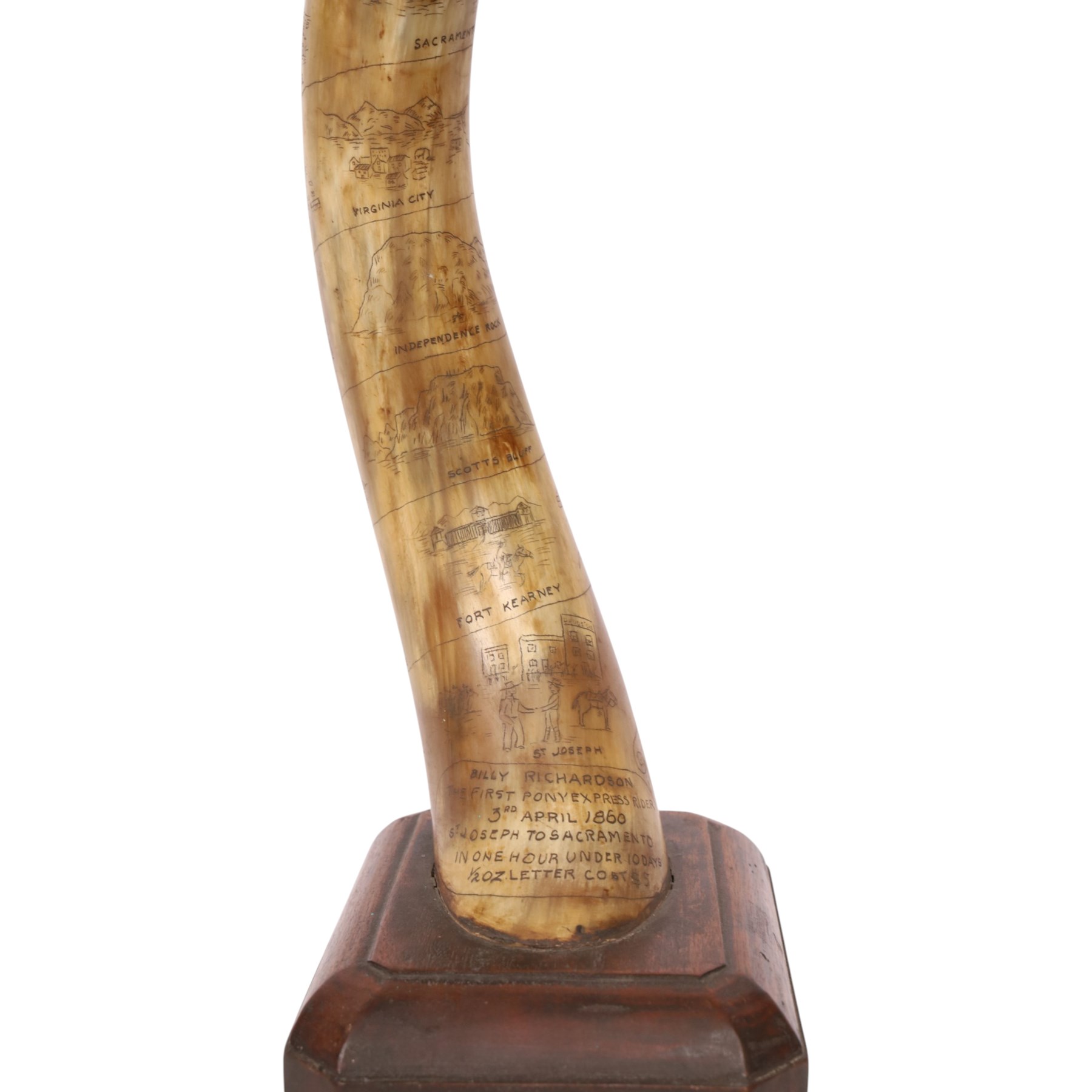 American horn with carvings to commemorate Billy Richardson the first Pony Express Rider dated April 1860 mounted on a wooden base 56cm
