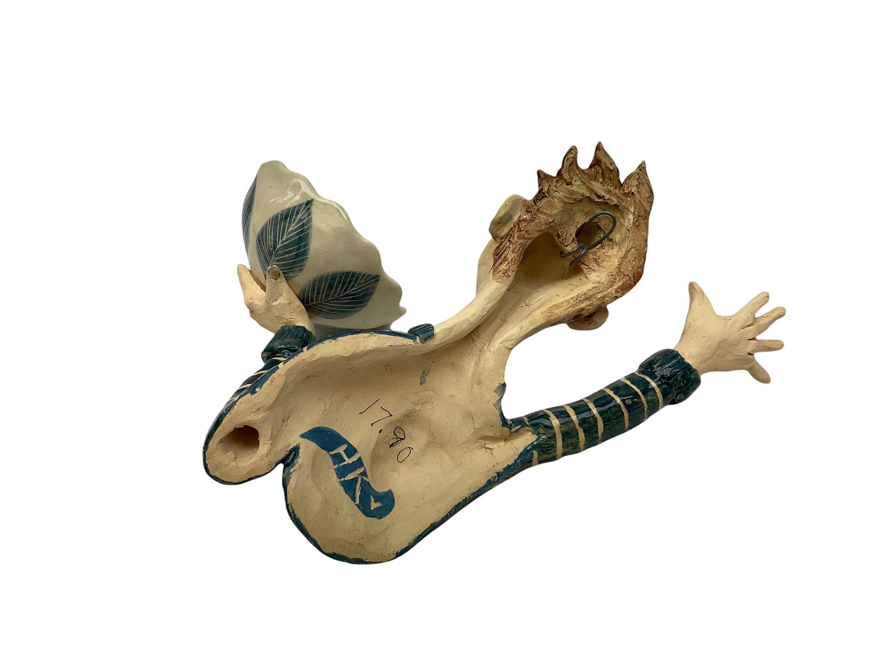 Ceramic 'girl and boy dish', by Helen Kemp, an oval dish with a mottled pink ground and gilt edging upon the sculpted heads of a girl and a boy, together with a 'boy sconce', by Helen Kemp, a sculpted boy holding a small bowl with foliate decoration, both with the artist's mark beneath.