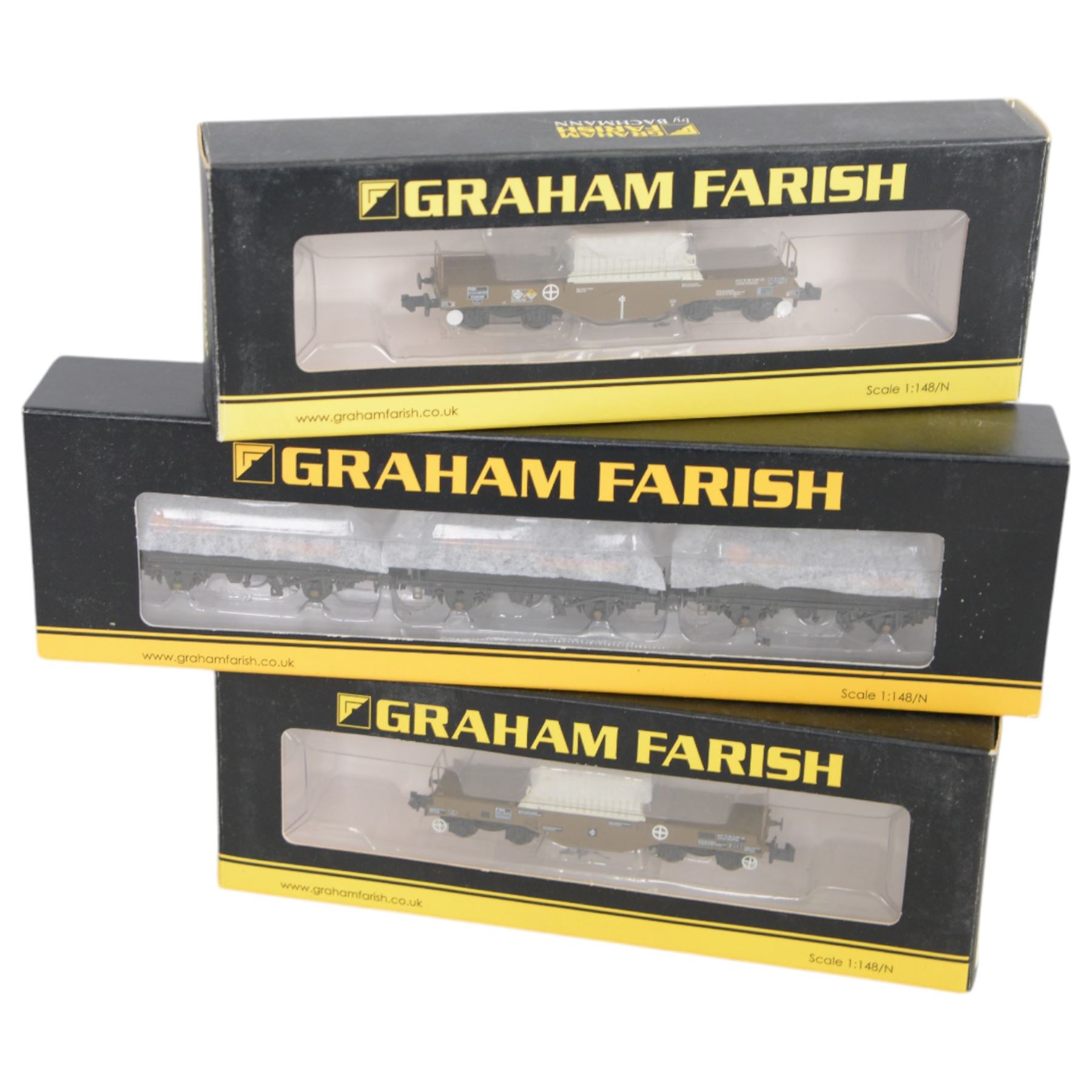 Graham Farish 'N' gauge rolling stock, comprising 373-785 Set of TTA Tank Wagons Shell Black Weathered, two 377801 FNA Nuclear Flask Wagon Flat Floor 550023, 377802 FNA Nuclear Flask Wagon Sloping Floor 550038, two 377075Y 7 Plank Wagons Leamington Priors and 377350 International Bogie Wagon with 45 Containers 'Seawheel', all boxed 