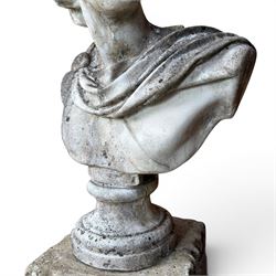 Roman Neoclassical style cast stone bust, weathered finish, raised on textured stone plinth of tapering form