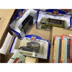 Collection of Tetley Tea collectibles to include sixteen 1:43 scale model cars from Lledo and Oxford Die-Cast with further Tetley Tea figures and tinned coaster set
