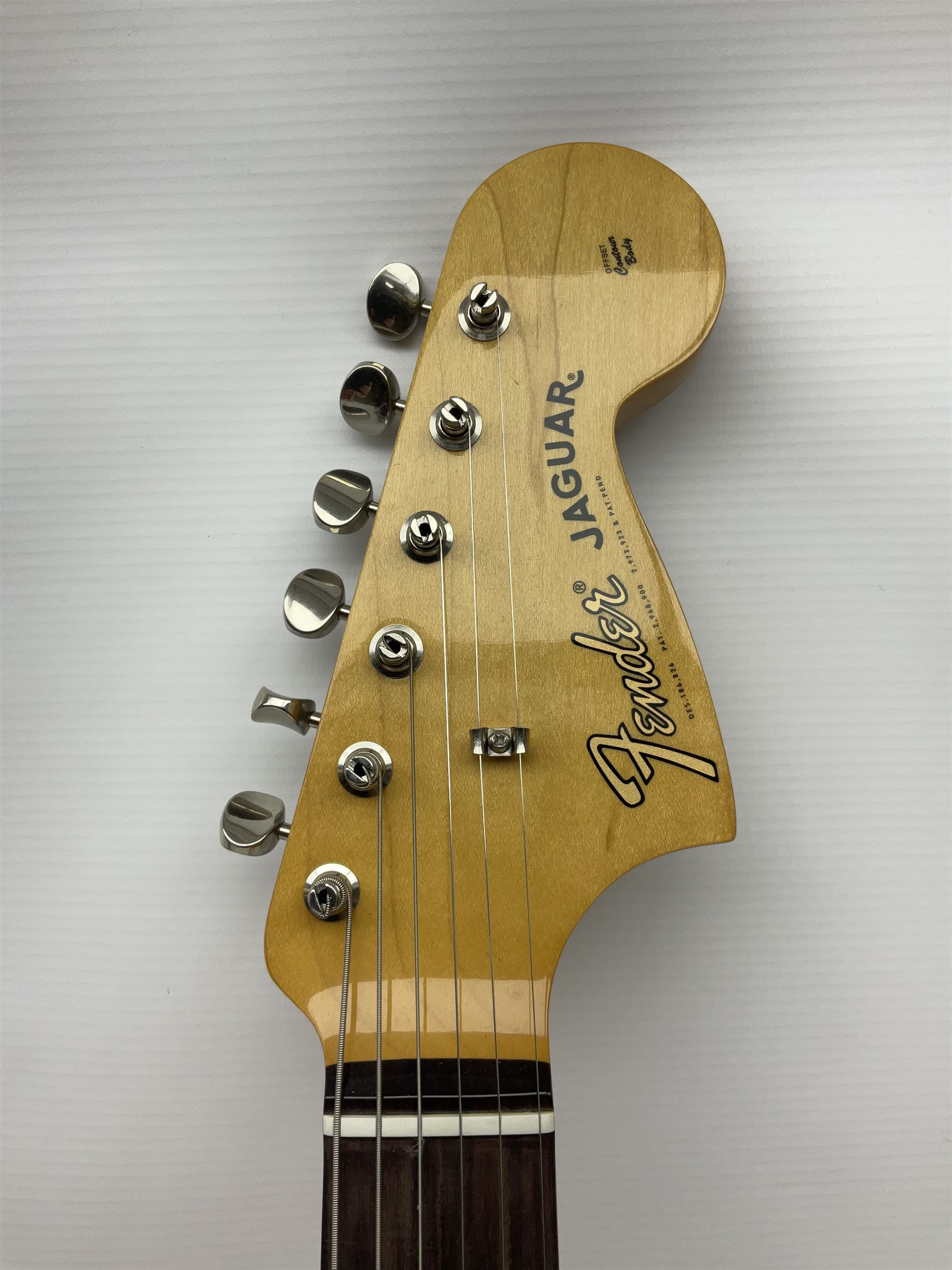 Mexican Fender Jaguar electric guitar with Humbucker pick-ups and tremolo arm, serial no.MX16741977, L101cm; in soft carrying case