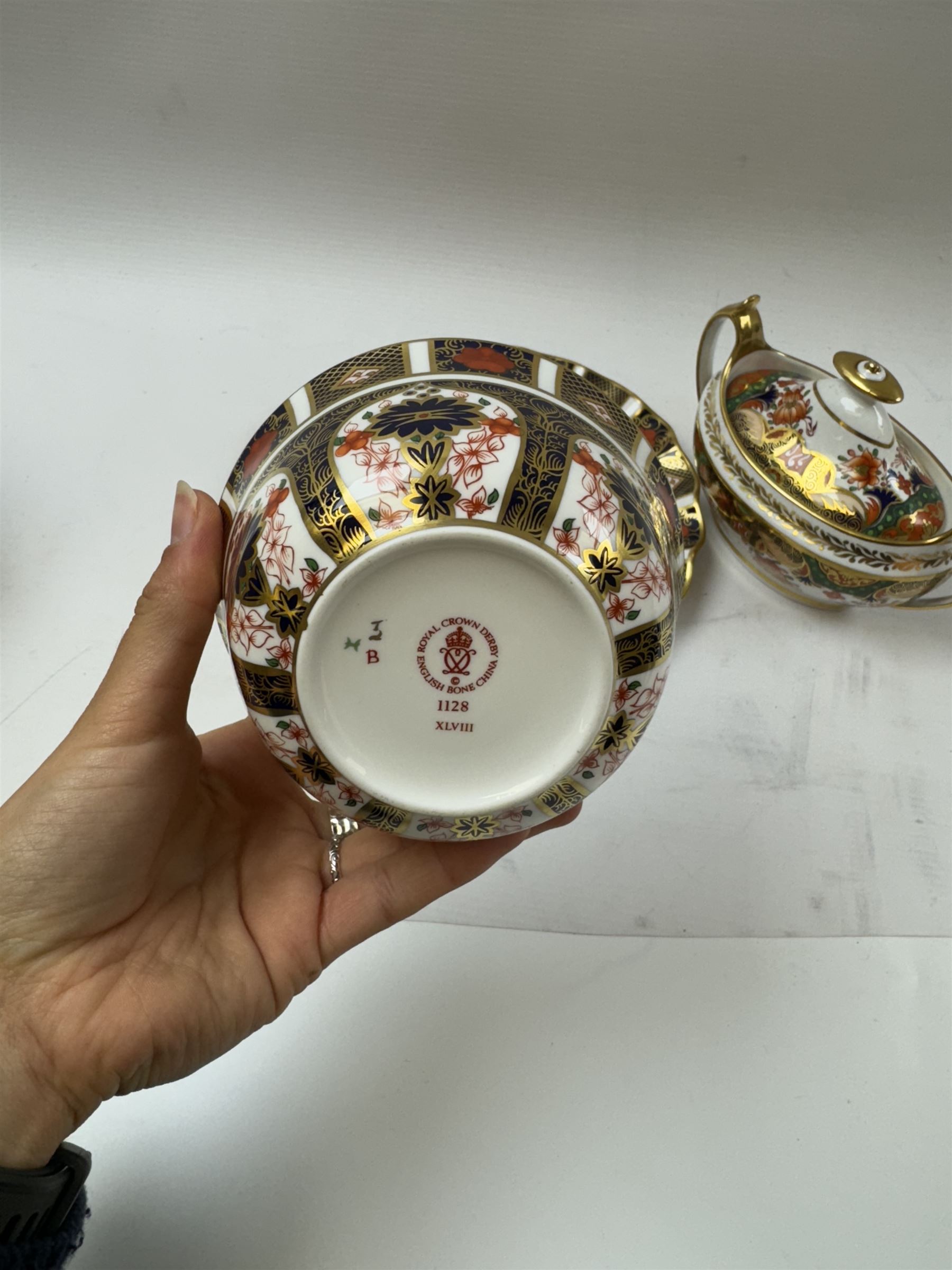 Royal Crown Derby 1128 Old Imari pattern, teacup and saucer, plate with fluted edge and open sucrier, together with spode twin handled sucrier