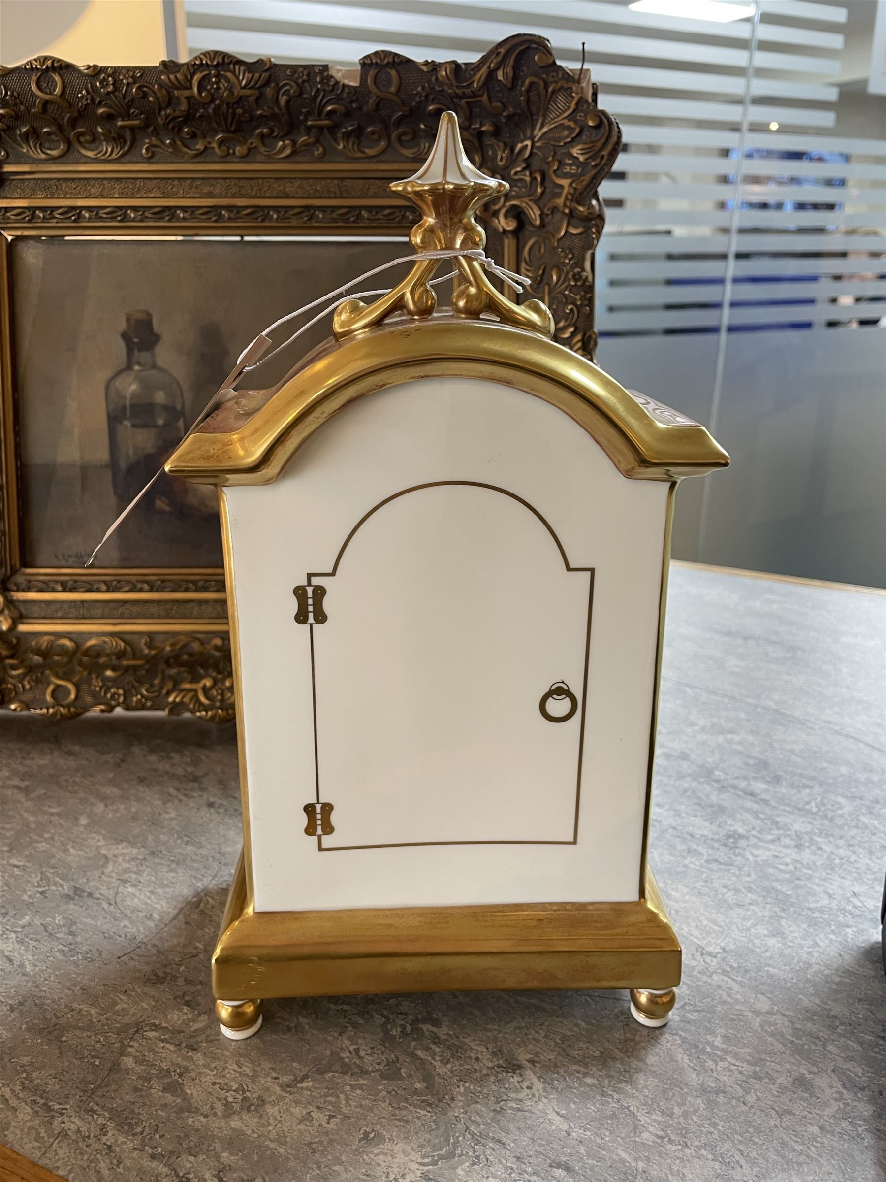 Late 20th century limited edition Royal Worcester mantle clock, hand painted by Jason Bowman with a still life of fruit upon mossy ground, signed J Bowman, with marks beneath including limited edition no 53/200, H27cm, with makers fitted card box 