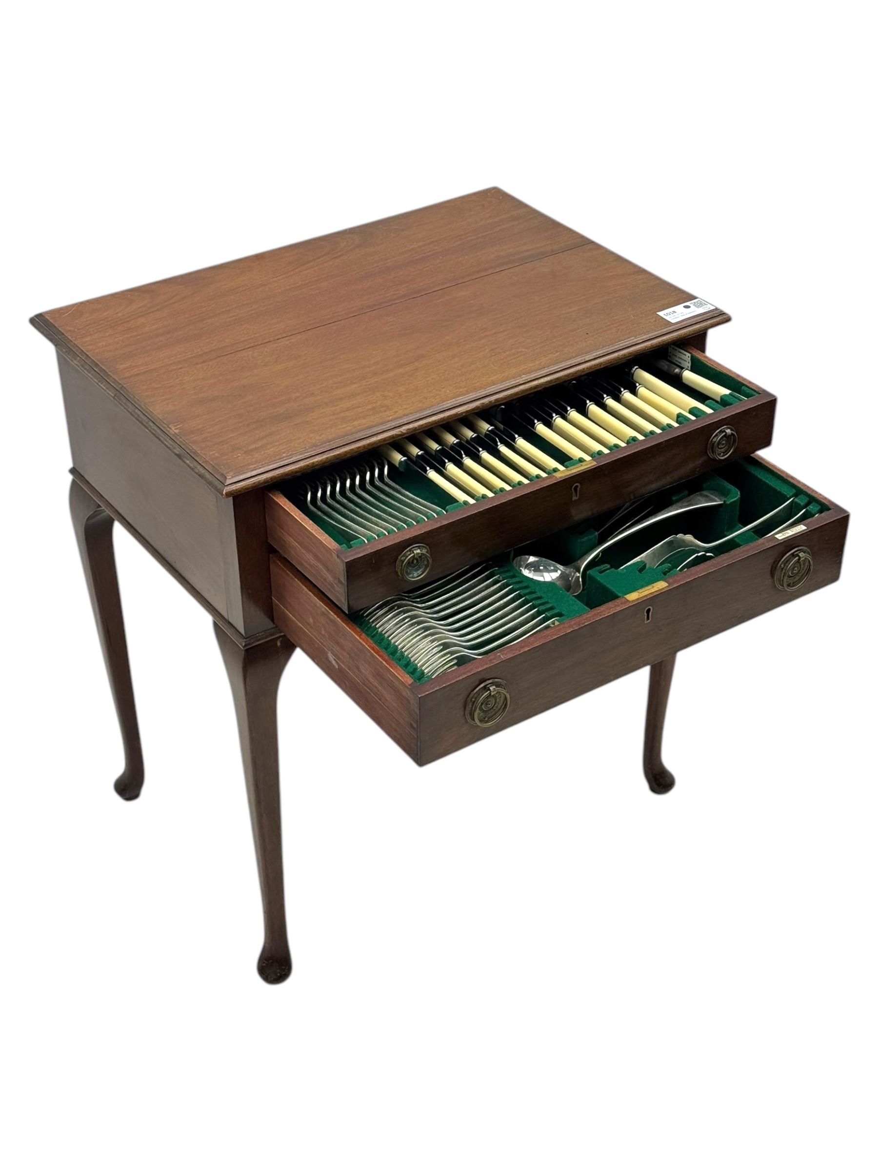 Walker & Hall - Edwardian mahogany canteen, rectangular top with moulded edges, two drawers enclosing silver plated cutlery, raised on cabriole supports 