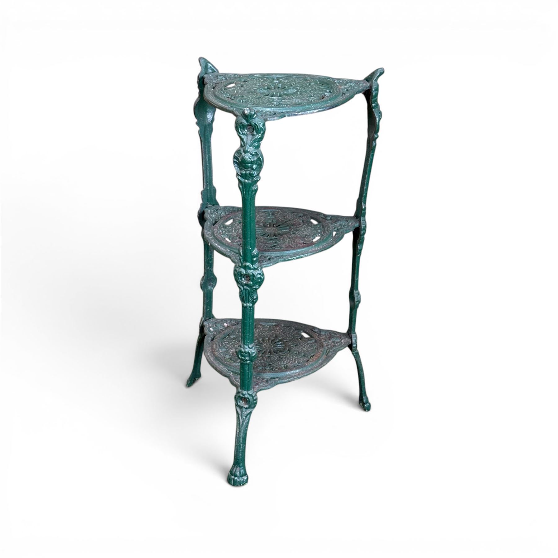 Ornate cast iron three tier garden plant or pan stand, green painted finish
