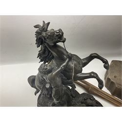 Spanish carved figure of Don Quixote, holding a book, base stamped 'Ouro, together with two spelter figures and one other