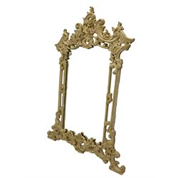 Rococo style carved wood wall mirror, decorated with scrolling foliage and flower head motifs