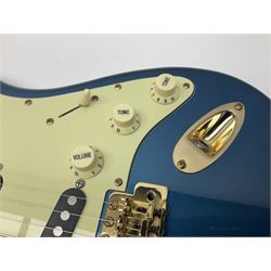 Fender Stratocaster style electric guitar in metallic blue with Rio Grande pick-ups and Fender back-plate L98cm; in Fender soft carrying case