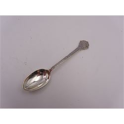 Set of eight modern silver teaspoons, each with cast Celtic style decoration, hallmarked Cooper Brothers & Sons Ltd, Sheffield 1960, contained within a tooled leather fitted case 