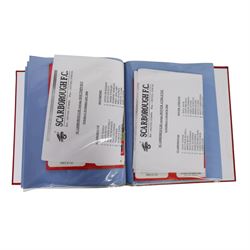 Comprehensive collection of approximately two hundred and twenty Scarborough FC football programmes for the 1999/00, 2000/01, 2001/02 and 2002/03 seasons, all filed within eight dedicated Scarborough FC red Home and Away binders