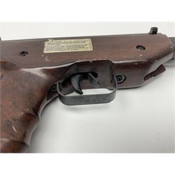 Four .177 air pistols comprising Hy-Score with moderator; American Classic with wood effect plastic fore-end and grips; T.J. Harrington & Son 'The Gat' with plunge barrel action; and another marked 'Made in China' NB: AGE RESTRICTIONS APPLY TO THE PURCHASE OF THIS LOT (4)